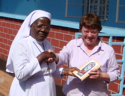 Superior General Sr Phina receives a donation from St Mary&rsquo;s